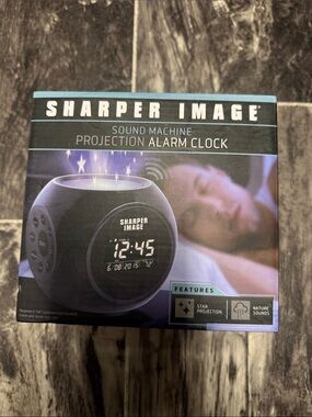 Sharper image projection alarm clock sound machine